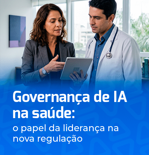 Executiva da saúde e médico analisam dados em um tablet ao discutir a governança de IA na saúde